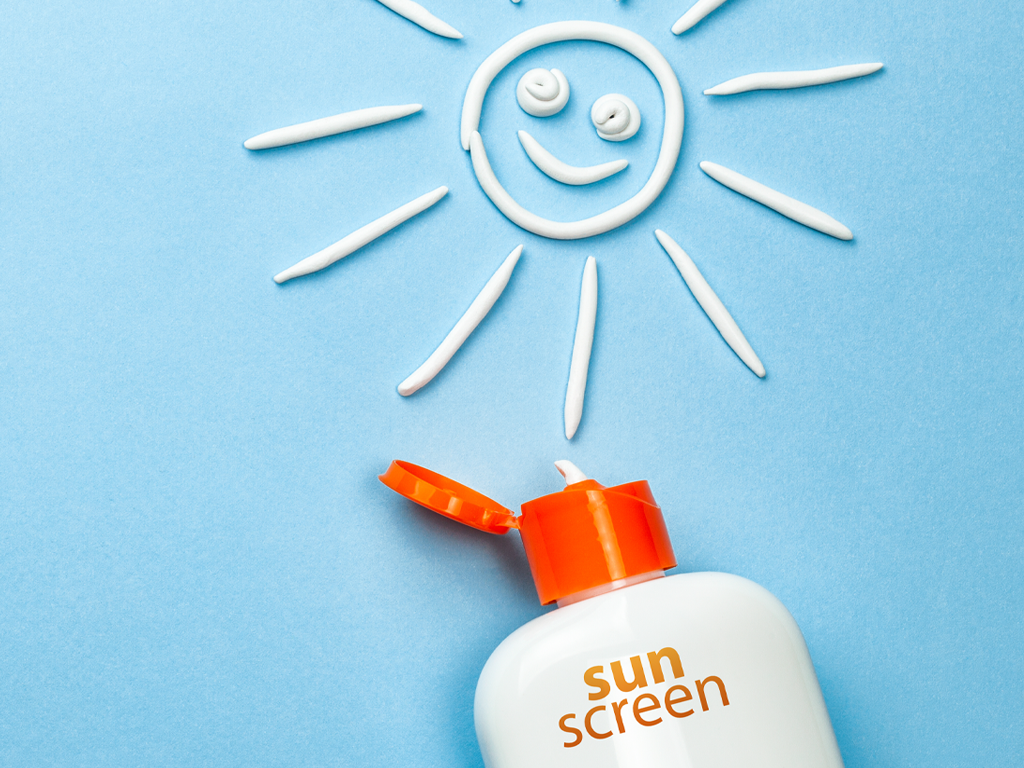 Sunscreen used to create an image of the sun. 