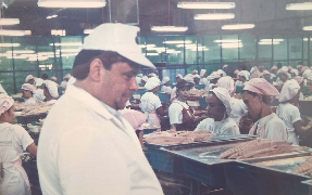 Martin Mitchell visiting a seafood facility overseas to help with quality inspections. 