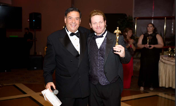 Martin Mitchell and Howie Bogner at Certified Laboratories holiday party. 
