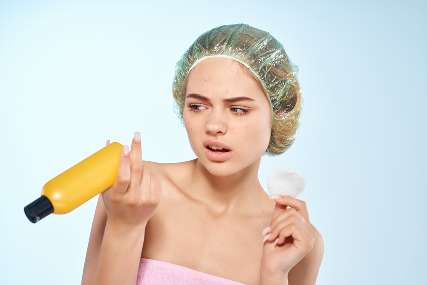Woman unhappy with shampoo in bottle due to failure to run photostability testing.